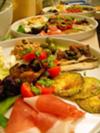 A large plate of starters, with a little bit of everything