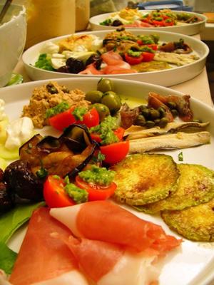 A large plate of starters, with a little bit of everything